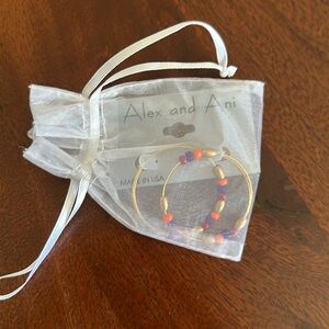 Beaded Alexan and Ani hoop earrings